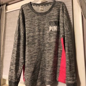 Victoria’s Secret sweatshirt.